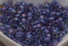 TOHO™ / Round / 6/0 / Inside-Color Rainbow Crystal/Metallic Purple-Lined / 10g