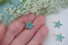 Gwiazdka z cyrkoniami / zawieszka / stal chirurgiczna / 16x13mm / złoty-błękitny / 1szt
