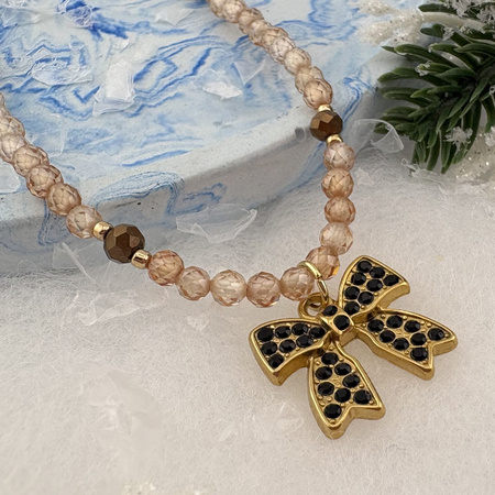 Kokardka z czarnymi cyrkoniami / zawieszka / stal chirurgiczna / 19x17mm / złoty / 1szt