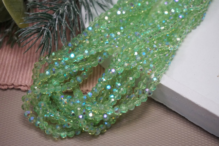 CrystaLove™ / kryształki szklane / rondelle / 3x4mm / Light Green AB / 110szt