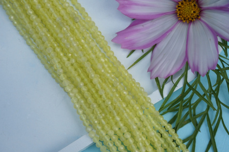 Kocie oko / kula fasetowana / 3mm / żółty / ok 120 szt / 1 sznur