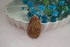 Jaspis / kaboszon / klasa AAA / 28x16x4mm / beżowy, różowy, brązowy / 1szt