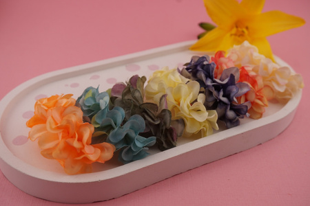 Kwiatek ozdobny / tkanina impregnowana, metal antyalergiczny/ pomarańczowy / ok 50x25mm / 1szt