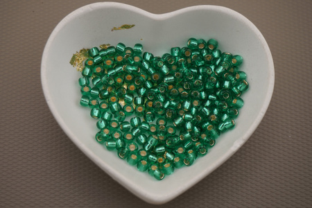 TOHO™ / Round / 6/0 / Silver-Lined Dk Peridot / 10g