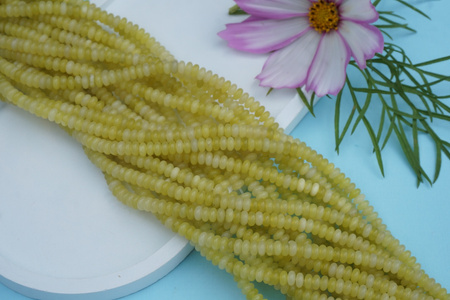 Jadeit cytrynowy / dyks / 4x2mm / żółty / sznur / 180szt