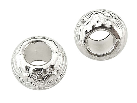 Oponka ze wzorkiem kwiatka , przekładka metalowa / kolor srebrny / 6,5x10mm / otwór 4,5mm