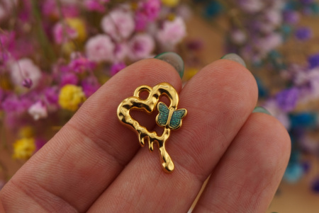 Serce z motylkiem niebieskim / zawieszka ze stali chirurgicznej / 21x15mm / złoty / 1szt