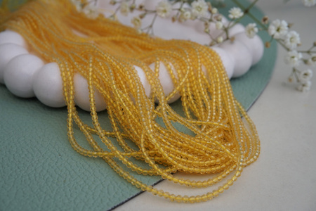 Kryształki / imitacja kwarcu / kulka fasetowana / 2mm / żółty / 170szt