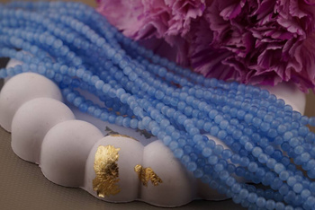 Kocie oko / kula / 4mm /  blado niebieski / ok 90 szt / 1 sznur