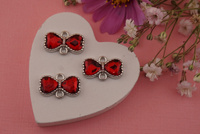 Kokardka z kryształkiem czerwonym / łącznik / metal / srebrny / 10,4x16,8mm/ 1szt