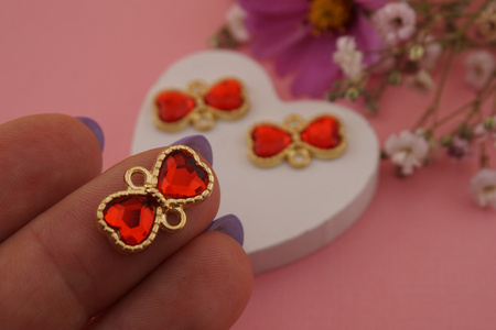 Kokardka z kryształkiem czerwonym / łącznik / metal / złoty / 10,4x16,8mm/ 1szt