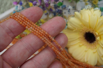 Awenturyn czerwony / kula fasetowana / 2mm / sznur / około 180szt