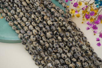 Jaspis dalmatyńczyk / owal / 6x8mm / sznur 38cm / około 40szt