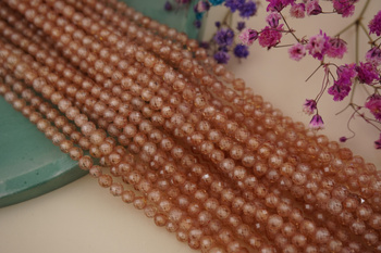 Cyrkonia szampańska / kula fasetowana / 4mm / sznur / około 90szt