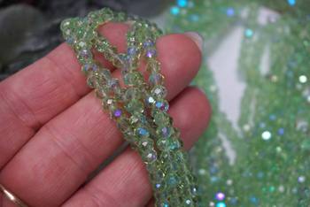 CrystaLove™ / kryształki szklane / rondelle / 3x4mm / Light Green AB / 110szt