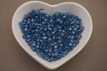 TOHO™ / Round / 6/0 / Inside-Color Rainbow Crystal/Lt Capri-Lined / 10g 