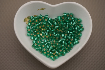 TOHO™ / Round / 6/0 / Silver-Lined Dk Peridot / 10g 