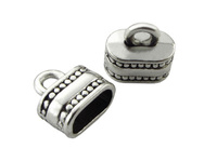Końcówka owalna ze zdobieniami / kolor srebrny / 10x10x6mm / otwór 4x8mm / uchwyt 2mm